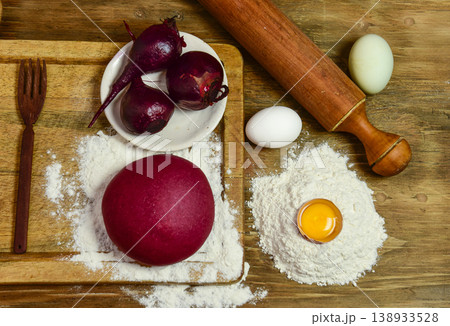 Purple dough bun for noodles with ingredients on the table. Purple dough bun for noodles with ingredients on the table. 138933528