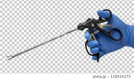 Gloved hand holding a long laparoscopic grasper or forceps with a ratcheted handle and jaw tip, isolated, representing minimally invasive surgery and operating room instruments Gloved hand holding a long laparoscopic grasper or forceps with a ratcheted handle and jaw tip, isolated, representing minimally invasive surgery and operating room instruments 138934375