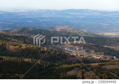 Aerial view of Karpacz town and forest from Snezka mountain in Poland Aerial view of Karpacz town and forest from Snezka mountain in Poland 138934449