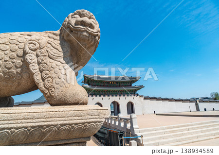 Seoul, South Korea - Apr. 12, 2026 : Haetae Statue and Gwanghwamun Gate under Blue Sky, Seoul, South Korea Seoul, South Korea - Apr. 12, 2026 : Haetae Statue and Gwanghwamun Gate under Blue Sky, Seoul, South Korea 138934589