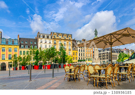 Street restaurant tables and chairs on La Grand Place square in Lille city center Street restaurant tables and chairs on La Grand Place square in Lille city center 138936185