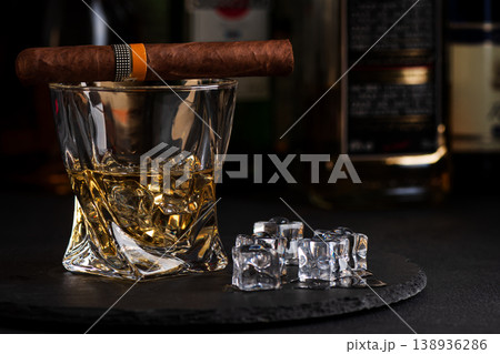 Whiskey Glass with Cigar. Luxurious Bar Ambience Whiskey Glass with Cigar. Luxurious Bar Ambience 138936286
