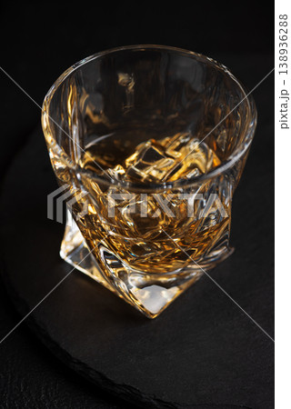 Whiskey Glass with Ice. Sophisticated Bar Ambience 138936288