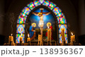 Mysterious church atmosphere with burning church candles on the background of a blurred crucifix  138936367