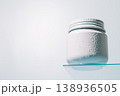 White cream jar on glass shelf 138936505