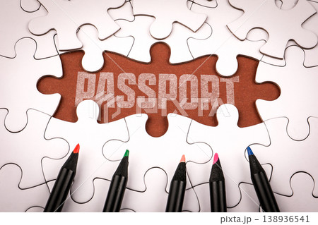 Passport Word on Puzzle Piece Surrounded by Jigsaw Background 138936541