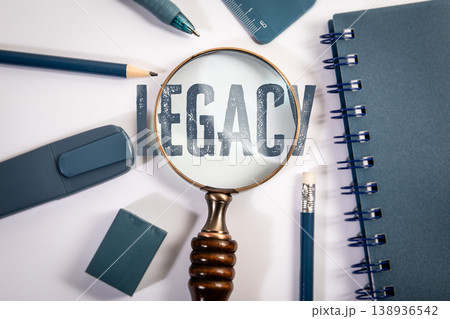 Legacy Word Seen Through Magnifying Glass on Desk Legacy Word Seen Through Magnifying Glass on Desk 138936542