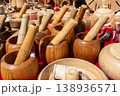 Traditional Wooden Mortar and Pestle Set Displayed at Local Market Handmade Kitchen Tools 138936571