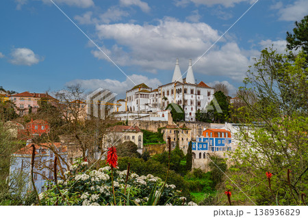 Palacio Nacional de Sintra with colorful houses and greenery Portugal Palacio Nacional de Sintra with colorful houses and greenery Portugal 138936829