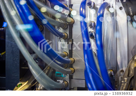 Mold plates - part of automatic injection molding machine at exhibition Mold plates - part of automatic injection molding machine at exhibition 138936932