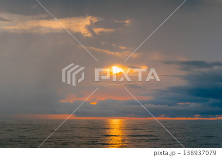View of amazing dramatic sunset over the Black Sea surface in the evening 138937079