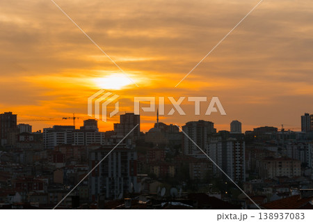 Dramatic sunset sky with the setting sun over the city, Istanbul, Turkey Dramatic sunset sky with the setting sun over the city, Istanbul, Turkey 138937083