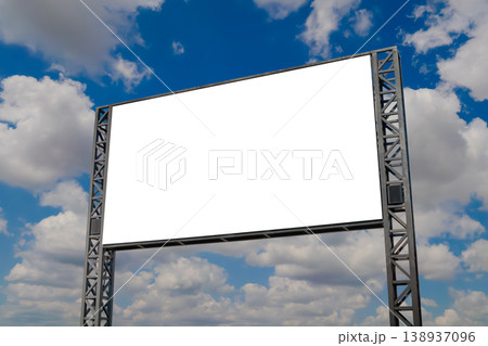 Mock up: blank white billboard and white clouds in the blue sky Mock up: blank white billboard and white clouds in the blue sky 138937096