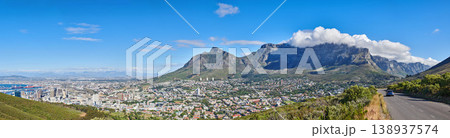 City landscape near mountains with a cloudy blue sky background on a sunny summer day. Beautiful cityscape of Cape Town, South Africa as a travel vacation or holiday destination in a coastal location 138937574