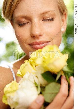 Relax, smile and woman in garden with roses in bouquet for holiday in spring for outdoor fun. Happiness, freedom and face of girl in park with flowers, weekend in countryside and sunshine on vacation 138937914