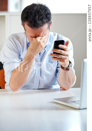 Business man, laptop and phone with stress, headache and thinking for finance review, mistake or tired. Accountant, pc and smartphone with burnout, fatigue or mental health with fail, glitch or error Business man, laptop and phone with stress, headache and thinking for finance review, mistake or tired. Accountant, pc and smartphone with burnout, fatigue or mental health with fail, glitch or error 138937957