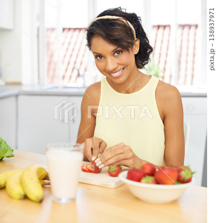 Portrait, strawberry and fruit salad with a woman in the kitchen of her home for health, diet or nutrition. Smile, food and weight loss with a young person in her apartment for meal preparation Portrait, strawberry and fruit salad with a woman in the kitchen of her home for health, diet or nutrition. Smile, food and weight loss with a young person in her apartment for meal preparation 138937971