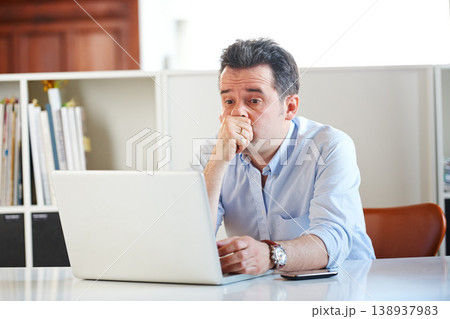 Businessman, laptop and stress or fear at office, email and online research on technology. Mature man, frustrated and anxiety on digital, problem and issues or glitch, 404 error and connection fail Businessman, laptop and stress or fear at office, email and online research on technology. Mature man, frustrated and anxiety on digital, problem and issues or glitch, 404 error and connection fail 138937983