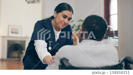 Consultation, healthcare and nurse with patient in a wheelchair for discussion at nursing home. Medical career, conversation and young female caregiver talking to woman with disability in her house. 138938251