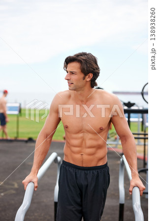 Man, thinking and fitness or exercise, planning and vision for performance, workout and training. Male athlete, strategy and inspiration for health, body building and shirtless by outdoor equipment Man, thinking and fitness or exercise, planning and vision for performance, workout and training. Male athlete, strategy and inspiration for health, body building and shirtless by outdoor equipment 138938260