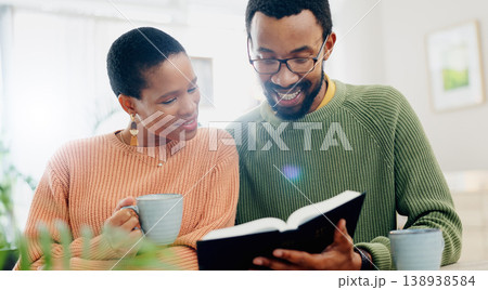 Home, relax and black couple with smile, reading a book or relax with religion, love or bonding together. Romance, apartment or man with woman, scripture or bible with Christian, hope or conversation Home, relax and black couple with smile, reading a book or relax with religion, love or bonding together. Romance, apartment or man with woman, scripture or bible with Christian, hope or conversation 138938584
