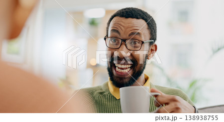 Coffee, conversation and excited man at home on a living room sofa with a talk and hot drink. Couple, tea and smile with communication and happy together with love and marriage support on a couch Coffee, conversation and excited man at home on a living room sofa with a talk and hot drink. Couple, tea and smile with communication and happy together with love and marriage support on a couch 138938755