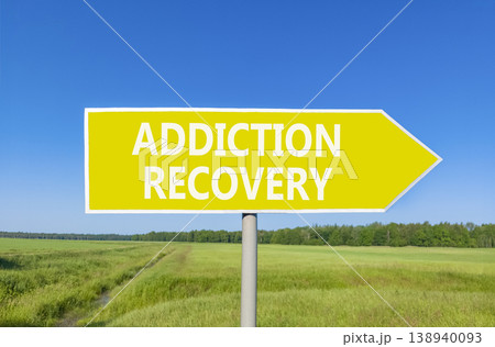 Addiction recovery symbol. Concept words Addiction recovery on beautiful yellow road sign. Beautiful blue sky green grass field background. Psychology addiction recovery concept. Copy space. Addiction recovery symbol. Concept words Addiction recovery on beautiful yellow road sign. Beautiful blue sky green grass field background. Psychology addiction recovery concept. Copy space. 138940093