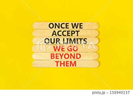 Beyond limits symbol. Concept words Once we accept our limits we go beyond them on wooden Sticks. Beautiful orange background. Business Once we accept our limits we go beyond them concept. Copy space. Beyond limits symbol. Concept words Once we accept our limits we go beyond them on wooden Sticks. Beautiful orange background. Business Once we accept our limits we go beyond them concept. Copy space. 138940137