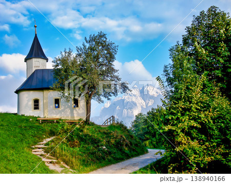 View of the St Antonius chapel in the Kaiser valley surrounded by forest and the rough Kaiser Mountains. Kufstein, Austria 138940166