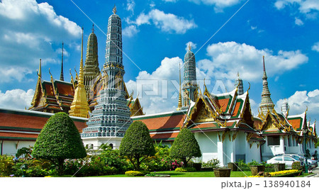 Ornate golden rooftops of Grand Palace in Bangkok, Thailand. Traditional Thai architecture Ornate golden rooftops of Grand Palace in Bangkok, Thailand. Traditional Thai architecture 138940184