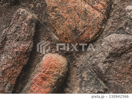 Large stones background old coarse cobblestones texture concrete surface brown solid structure rough, close-up Large stones background old coarse cobblestones texture concrete surface brown solid structure rough, close-up 138942566