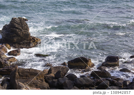 It's a seaside scenery with rocks. It's a seaside scenery with rocks. 138942857