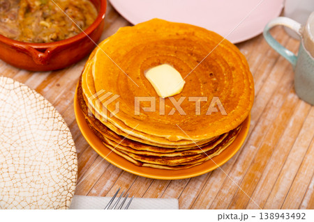 Pancakes with meat and vegetables stew machanka Pancakes with meat and vegetables stew machanka 138943492