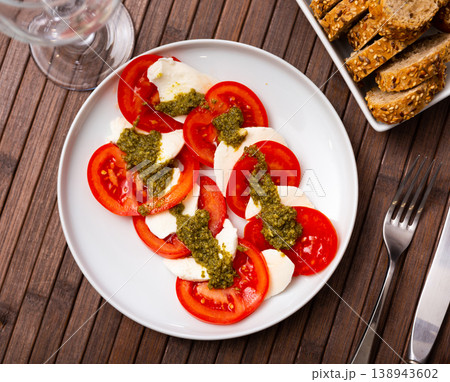 Caprese salad with tomato, mozzarella and balsamic dressing Caprese salad with tomato, mozzarella and balsamic dressing 138943602