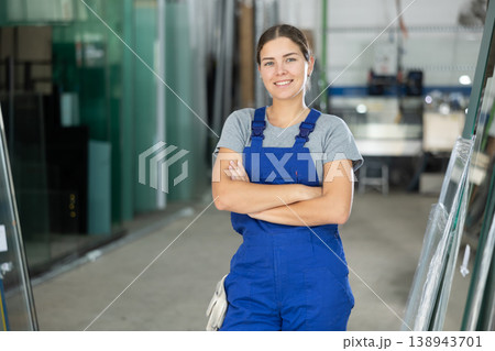 Confident smiling young female worker in glass workshop Confident smiling young female worker in glass workshop 138943701