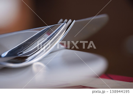 Elegant minimalist shot of polished stainless steel cutlery with a shallow depth of field 138944195