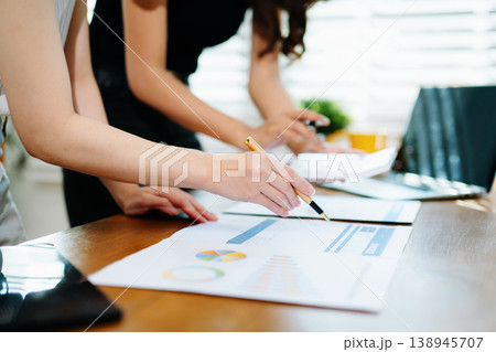 Team business meeting presentation. Hand businessman working project in modern office.Laptop computer and tablet and smart phone 138945707