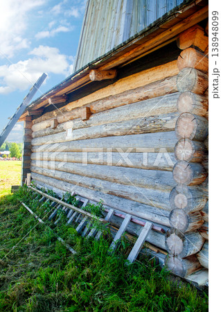 Corner of Wooden Log Cabin with Notched Joint, Close-Up Corner of Wooden Log Cabin with Notched Joint, Close-Up 138948099