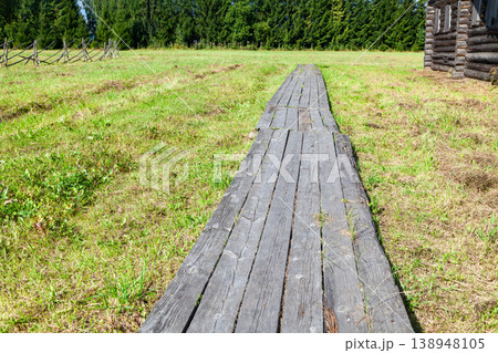 Old Wooden Plank Walkway in Village, Close-Up 138948105