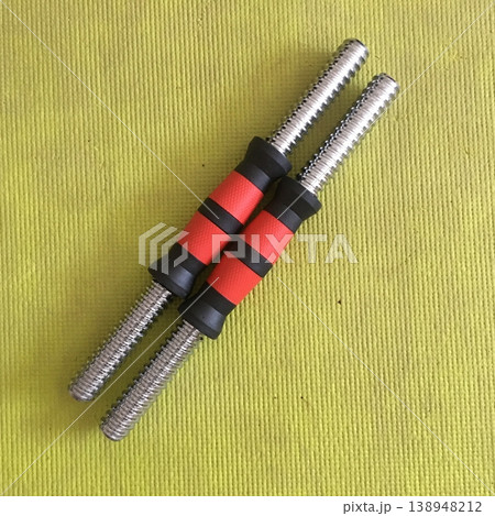 Metal screws with rubber grips positioned on a green background for assembly and construction purposes Metal screws with rubber grips positioned on a green background for assembly and construction purposes 138948212