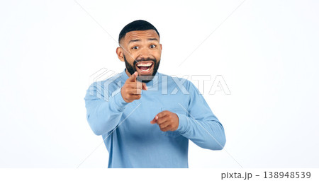 Portrait, man and pointing in studio with smile for motivation, selection and encouragement on white background. Face, person and hand gesture with happiness for decision or choice with mock up space Portrait, man and pointing in studio with smile for motivation, selection and encouragement on white background. Face, person and hand gesture with happiness for decision or choice with mock up space 138948539