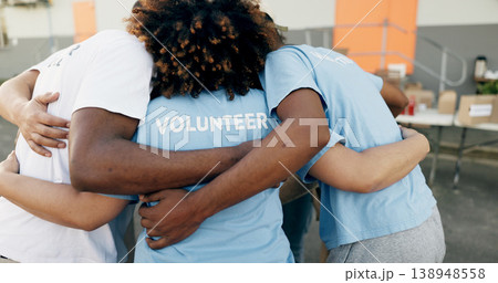 Community, charity and a volunteer group in a huddle together for teamwork, unity or solidarity. Recycle, team building and sustainability with ngo people hugging in support of an earth day project Community, charity and a volunteer group in a huddle together for teamwork, unity or solidarity. Recycle, team building and sustainability with ngo people hugging in support of an earth day project 138948558