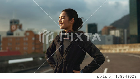 Training, city smile and outdoor woman looking at view, buildings and happy for morning cardio, wellness or workout. Happiness, fitness and urban athlete, runner or person exercise in Chicago, USA Training, city smile and outdoor woman looking at view, buildings and happy for morning cardio, wellness or workout. Happiness, fitness and urban athlete, runner or person exercise in Chicago, USA 138948628