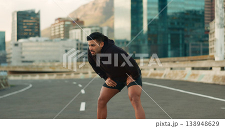 Man, athlete and breathe in road for fitness, exercise or wellness with city background or nature. Runner, person and break or tired for workout, training and healthy body with sportswear in street Man, athlete and breathe in road for fitness, exercise or wellness with city background or nature. Runner, person and break or tired for workout, training and healthy body with sportswear in street 138948629