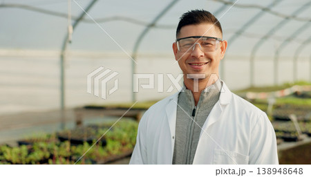 Portrait, botanist and happy man at greenhouse for science farm organic vegetables, plant or growth for ecology. Face, smile and scientist at nursery for agriculture in goggles for research in Mexico 138948648