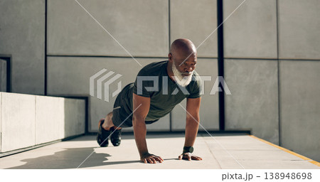 Mature, man and fitness for exercise with pushup for strength, health or wellness by outside. African person, alone and training near stairs for workout with endurance, concentration and dedication Mature, man and fitness for exercise with pushup for strength, health or wellness by outside. African person, alone and training near stairs for workout with endurance, concentration and dedication 138948698