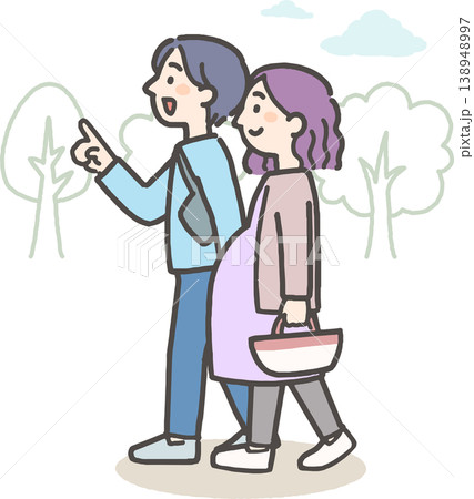 自然の中をお出かけする妊娠中の女性とパートナーの若い夫婦 自然の中をお出かけする妊娠中の女性とパートナーの若い夫婦 138948997