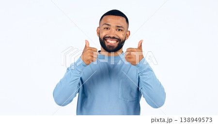 Thumbs up, man and portrait with sign for yes in studio, white background with happiness, support. Thank you, hands and person smile for success, agreement or positive emoji with achievement of goal 138949573