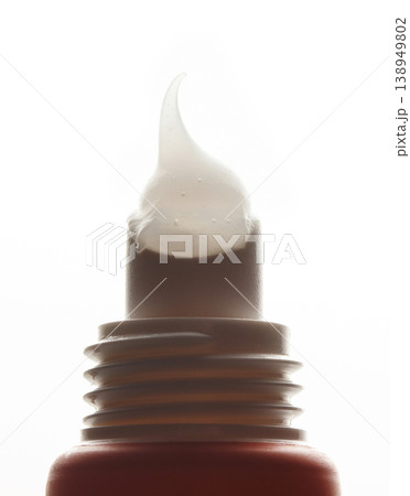 Glossy Lip Balm Texture on Applicator Tip 138949802