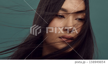 Beautiful girl with smooth, silky dark brown flying hair. Beautiful girl with smooth, silky dark brown flying hair. 138949854